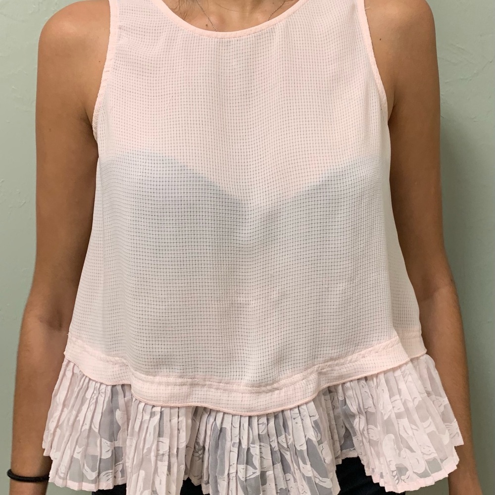 Light pink peplum top